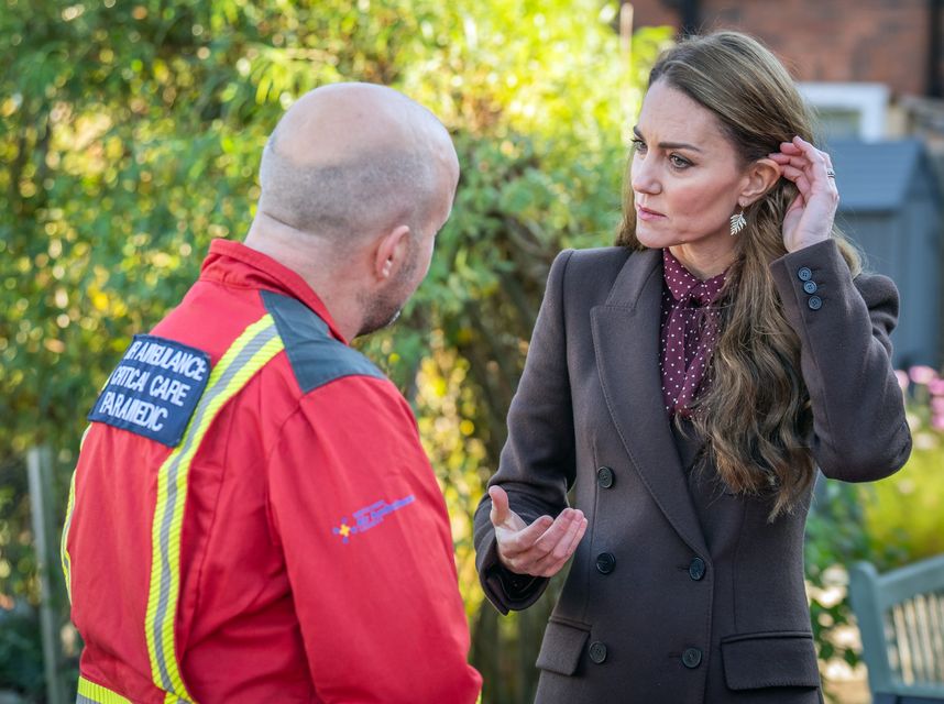 The Princess of Wales spoke with a critical care paramedic from the Air Ambulance during a visit to Southport Community Centre to meet rescue workers and the families of those caught up in the Southport knife attack (Danny Lawson/PA)