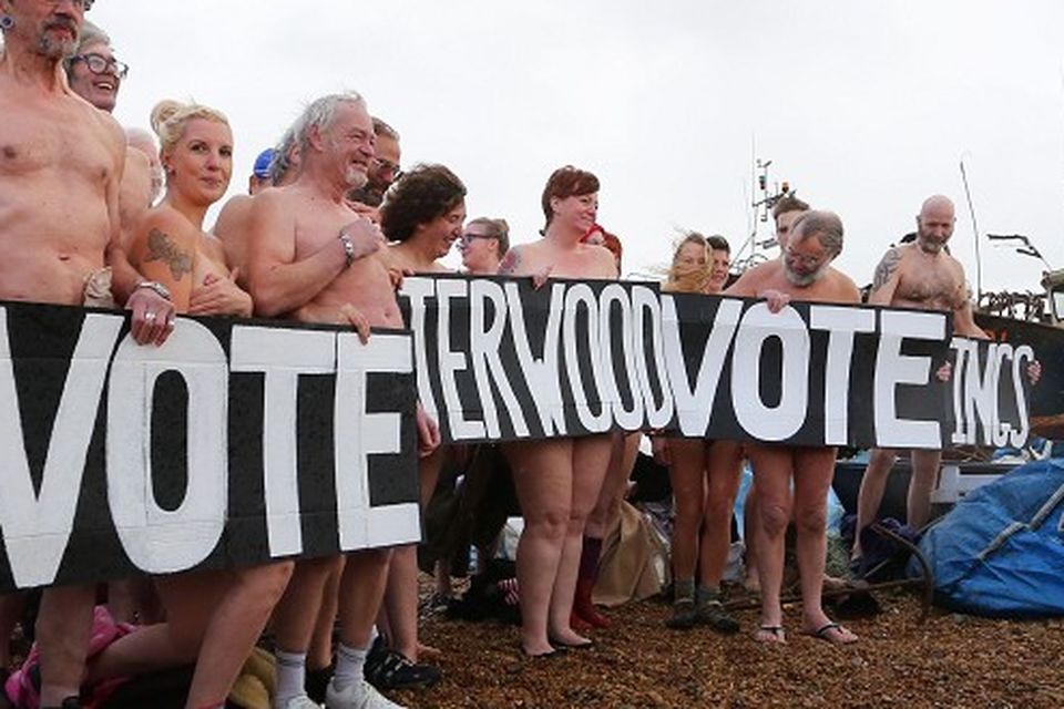 Residents of Hastings in East Sussex bare all in a naked flash mob on the beach, as the Jerwood Gallery in the town competes to win a photographic portrait session with photographer Spencer Tunick