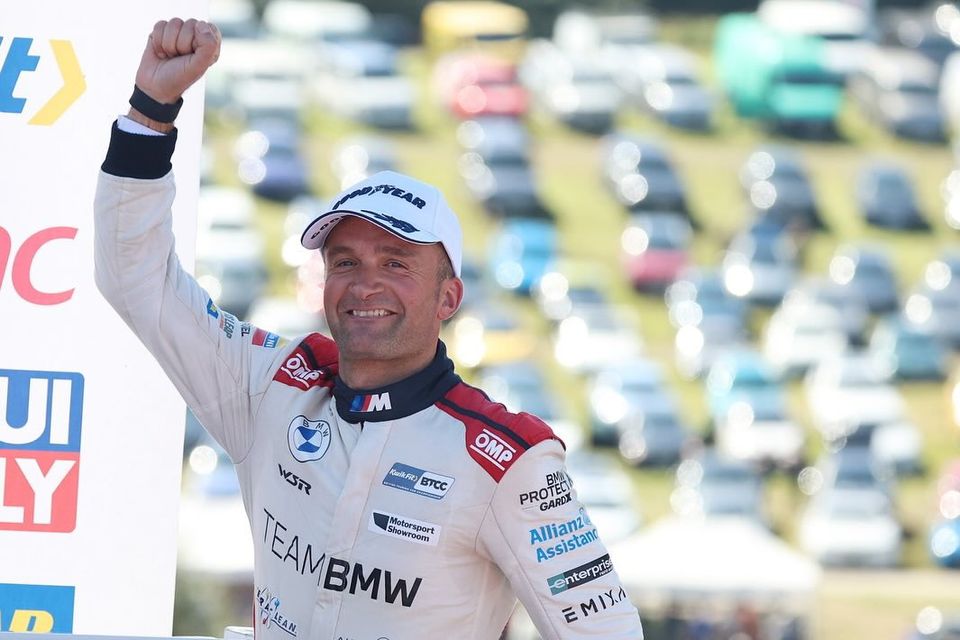 Colin Turkington celebrates his race victory at Knockhill on a successful weekend's work