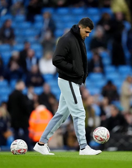 Rodri was seen kicking a ball at the Etihad Stadium at the weekend (Martin Rickett/PA)