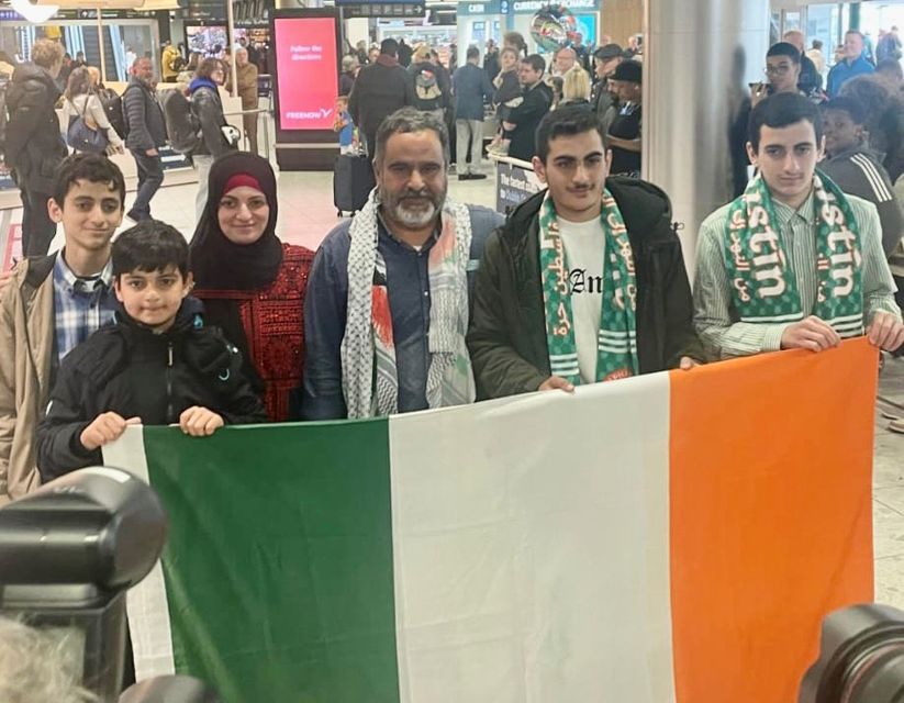 Zak Hania (centre) and his wife Batoul and their four children after being reunited at Dublin Airport (Family handout/PA)
