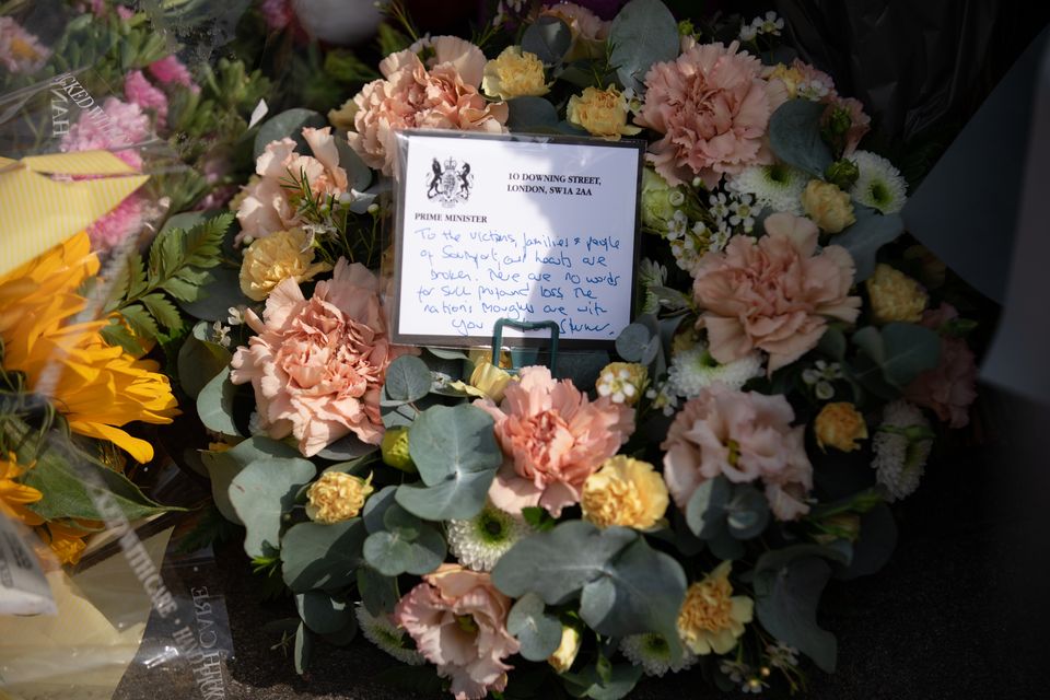 The message left by a floral tribute placed near the scene of the attack by Sir Keir Starmer (James Speakman/PA)