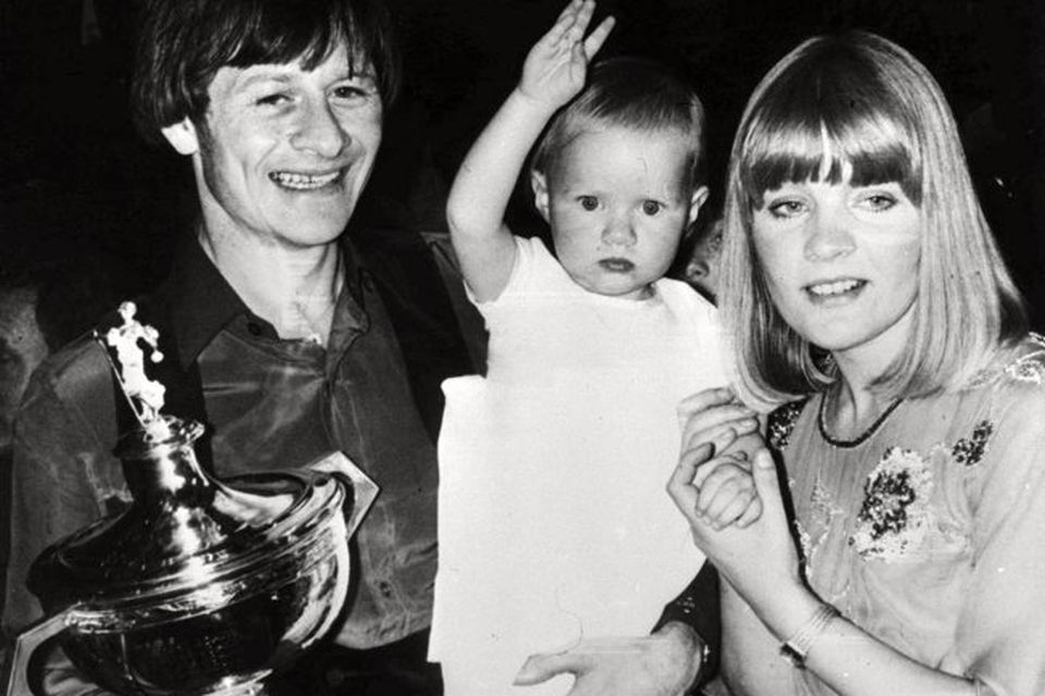 17-05-1982, World Snooker Champion, Alex Higgins is saluted by his baby daughter Lauren with his wife Lynne, after a nail-biting battle against six-times champion Ray Reardon at Sheffield's Crucible Theatre.