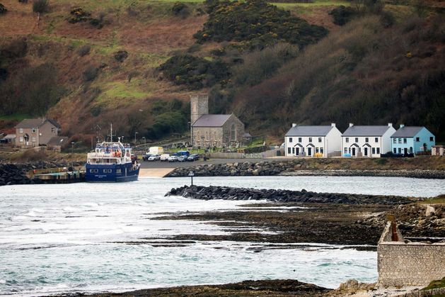 Rathlin Island: RNLI and emergency services tackle rough seas to evacuate patient