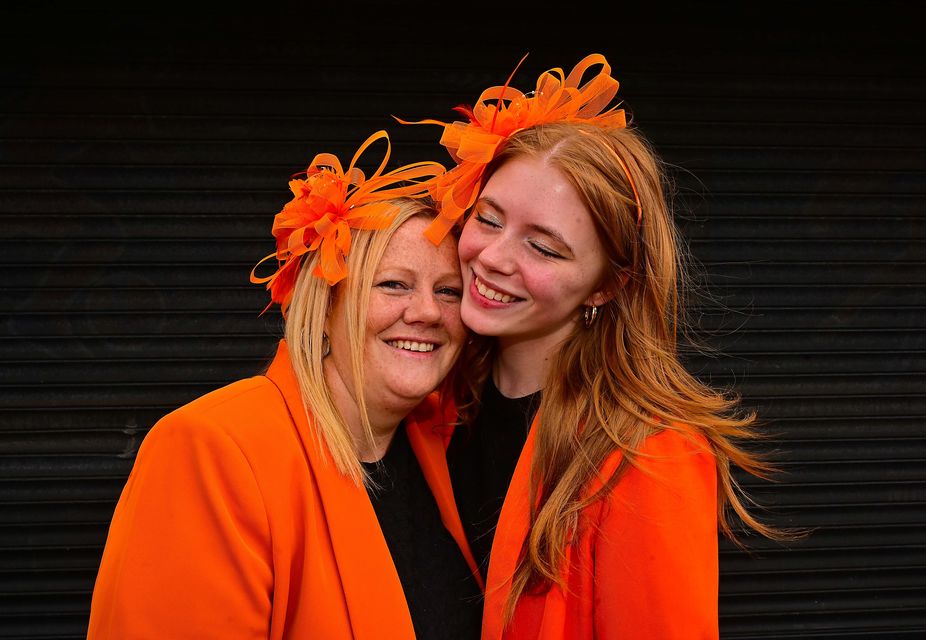 Julie Whelan and Leah McCunnin gather at Carlisle Circus in Belfast ahead of the main Orange Order parade in the city.
Picture By: Arthur Allison/Pacemaker Press.