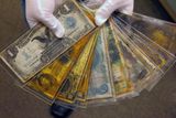 thumbnail: Currency, part of the artifacts collection of the Titanic, is shown as part of the artifacts collection at a warehouse in Atlanta, Friday, Aug 15, 2008. The 5,500-piece collection contains almost everything recovered from the wreckage of the RMS Titanic, which has sat 2.5 miles below the surface of the Atlantic ocean since the boat sank on April 15, 1912.