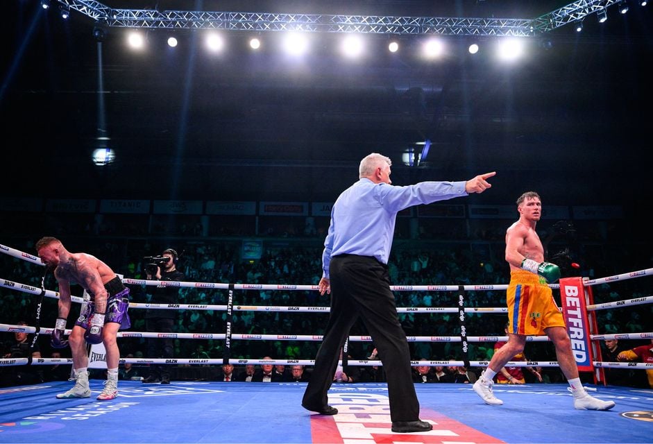 Paddy Donovan, right, is disqualified by referee Marcus McDonnell after punching Lewis Crocker after the bell during their IBF welterweight eliminator bout at SSE Arena in Belfast. Photo by Ramsey Cardy/Sportsfile