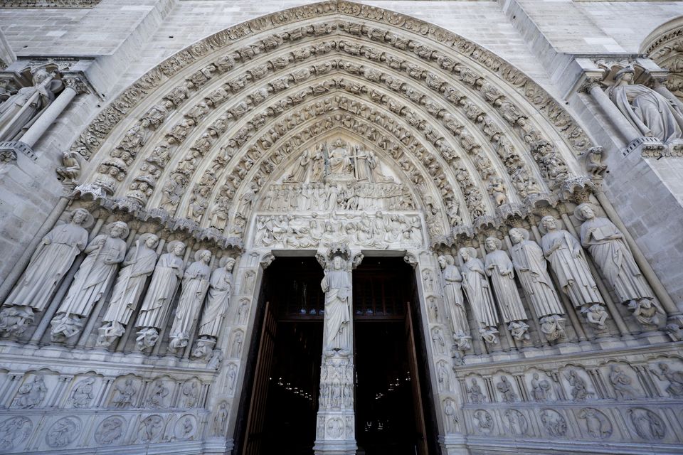 The main entrance of Notre Dame (Stephane de Sakutin/Pool Photo via AP)