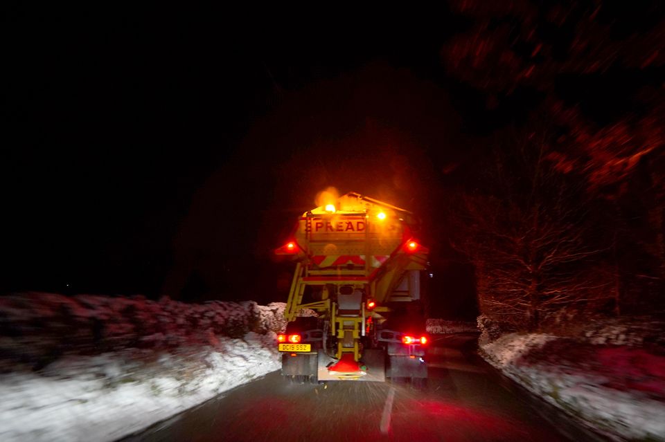 A gritter salts a road in the centre of Buxton, Derbyshire (Peter Byrne/PA)