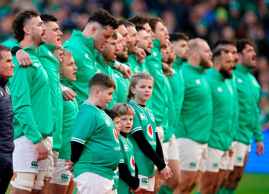 Ireland's Caelan Doris (left) and his team-mates sing the national anthem before the Six Nations clash with Italy