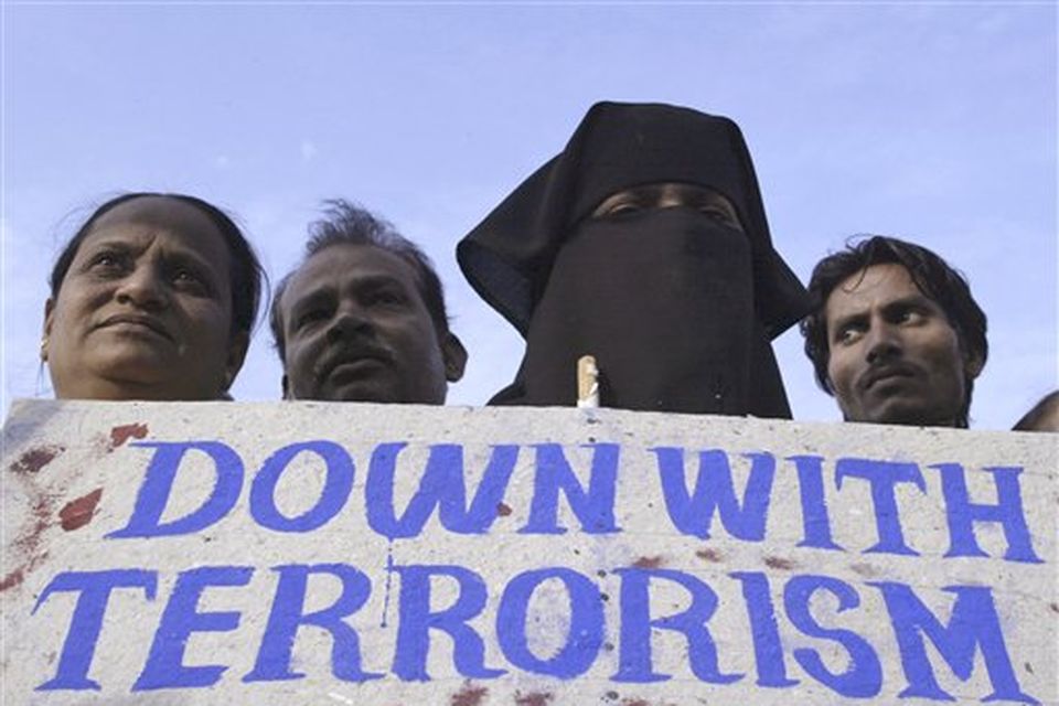 Indian Muslims,protest against terrorist attacks in Mumbai, as a placard reads " Kill terror not terrorist " in Ahmadabad, India, Saturday, Nov. 29, 2008. Indian commandos killed the last remaining gunmen holed up at a luxury Mumbai hotel Saturday, ending a 60-hour rampage through India's financial capital by suspected Islamic militants that killed people and rocked the nation. (AP Photo/Ajit Solanki)