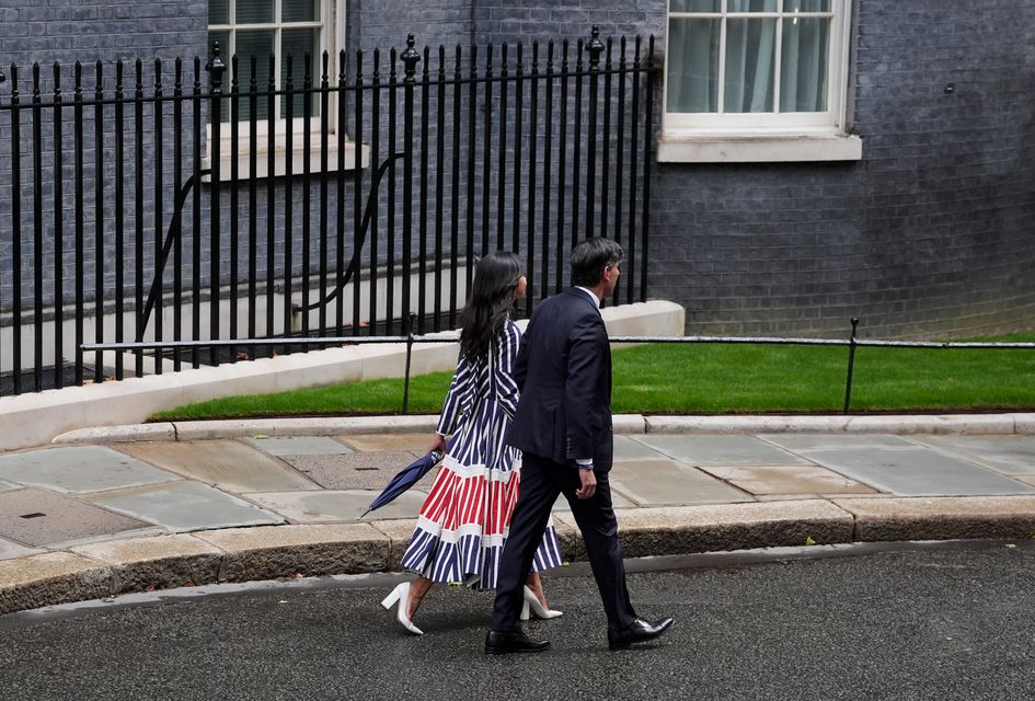 Rishi Sunak and Akshata Murty leave Downing Street following the Conservatives’ election defeat (Gareth Fuller/PA)