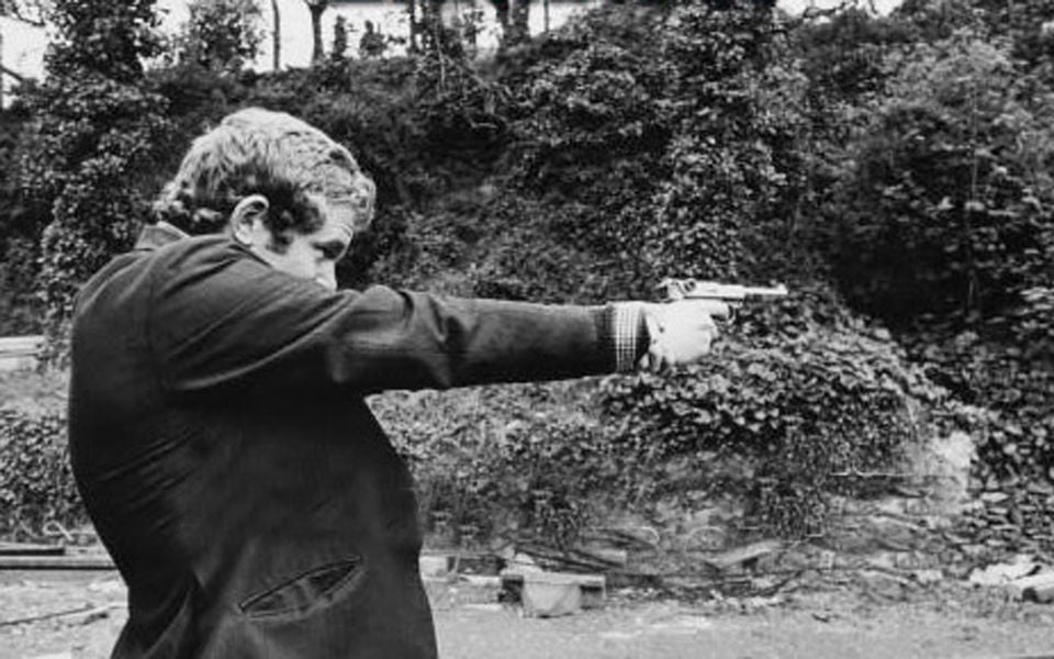 Martin McGuinness takes aim – he was the driving force behind the IRA campaign in Derry