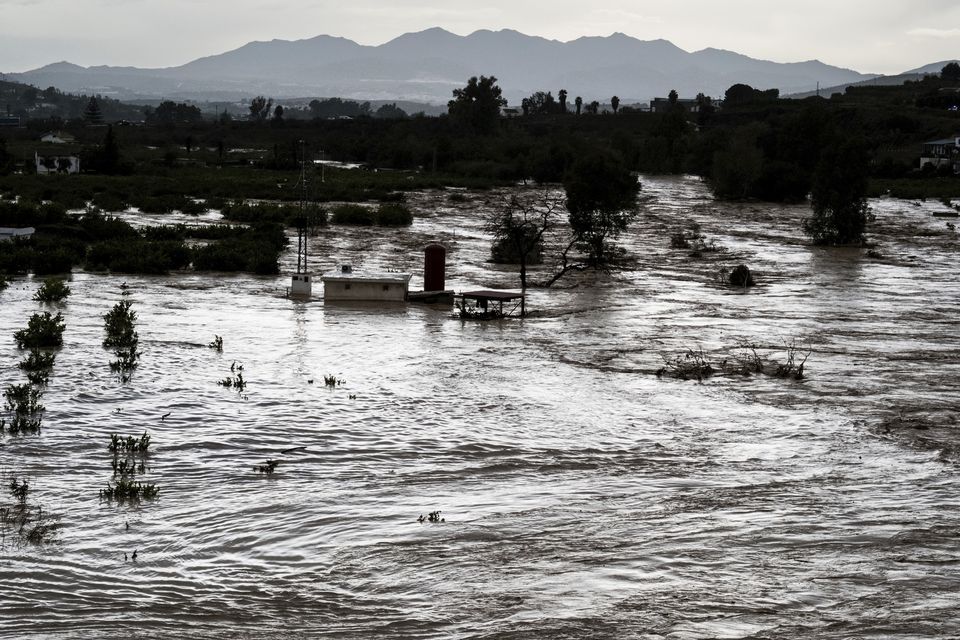 A view of the rising river in Alora, Malaga (Gregorio Marrero/AP)