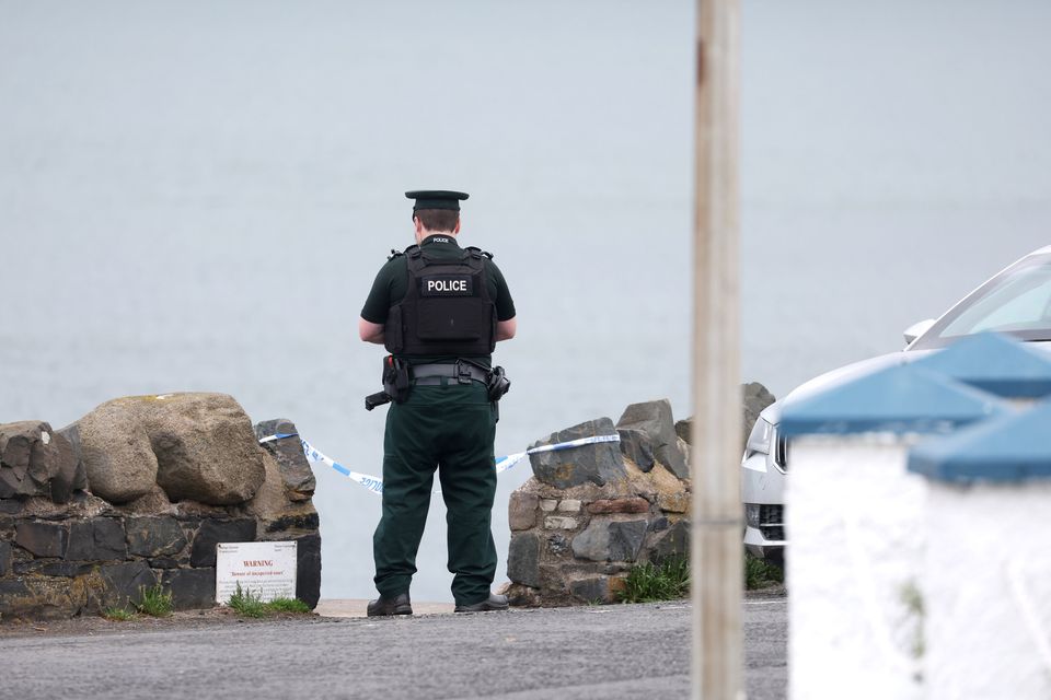 Police at the scene after a woman’s body was found on a beach in Cultra. Image: Jonathan Porter/Press Eye