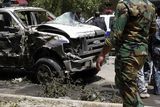 thumbnail: Security forces inspect the scene of a car bomb attack in Karradah in Baghdad, Iraq (AP)