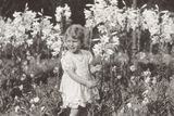 thumbnail: Princess Elizabeth of York with lilies in 1929