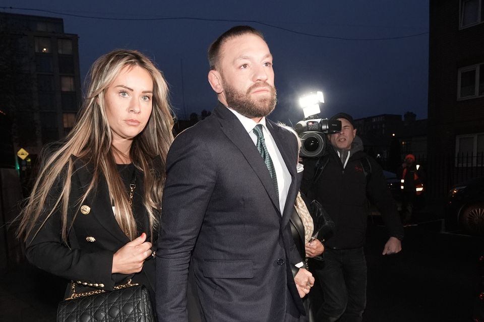 Conor McGregor and his partner Dee Devlin (Brian Lawless/PA)