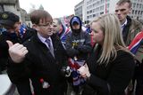 thumbnail: Willie Frazer talks to Sara Girvin as loyalist protestors converge on Belfast city hall. Picture date: Saturday January 5, 2013