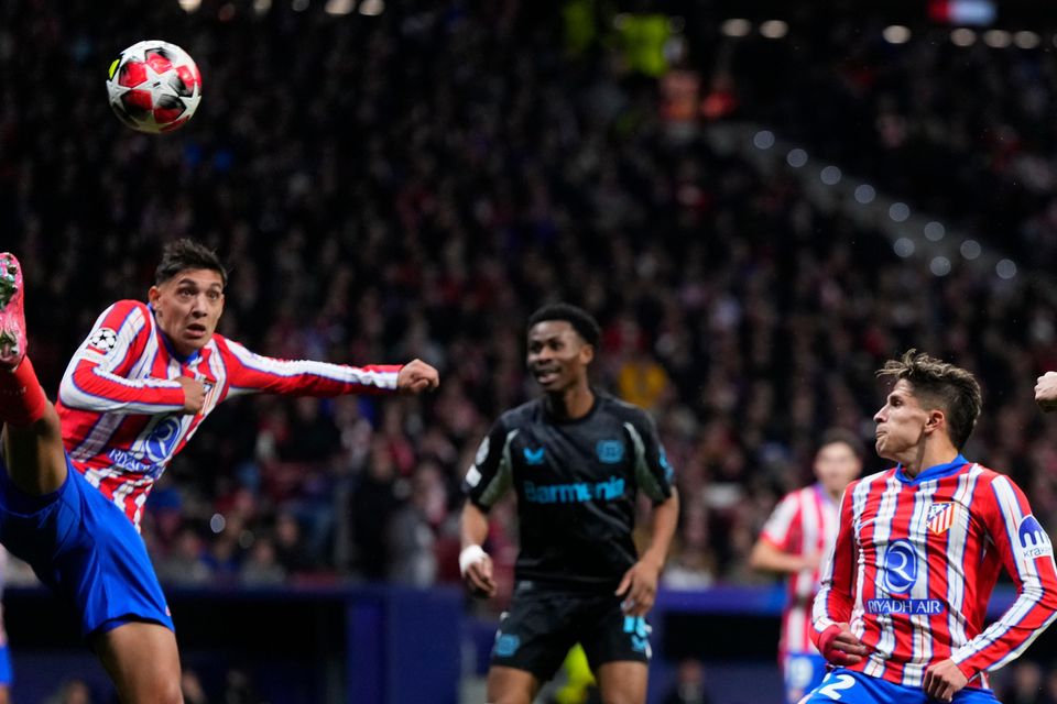 Piero Hincapie heads Bayer Leverkusen in front (Manu Fernandez/AP)