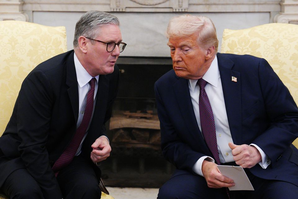 US President Donald Trump and Prime Minister Sir Keir Starmer in the Oval Office at the White House (Carl Court/PA)