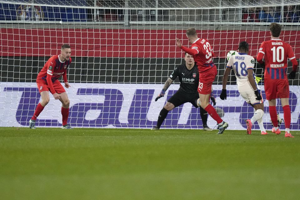 Christopher Nkunku, second from right, opens the scoring (Matthias Schrader/AP)