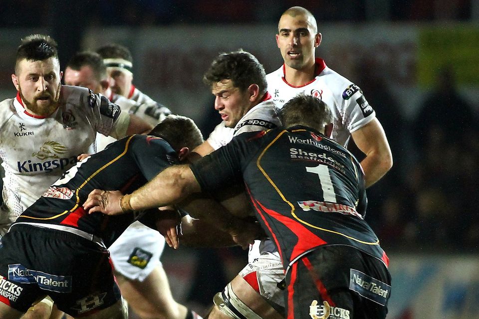 Newport Gwent Dragons v Ulster - GuinnessPro12 - Sean Reidy of Ulster is tackled by Lewis Evans(L) and Sam Hobbs of Dragons. Press Eye