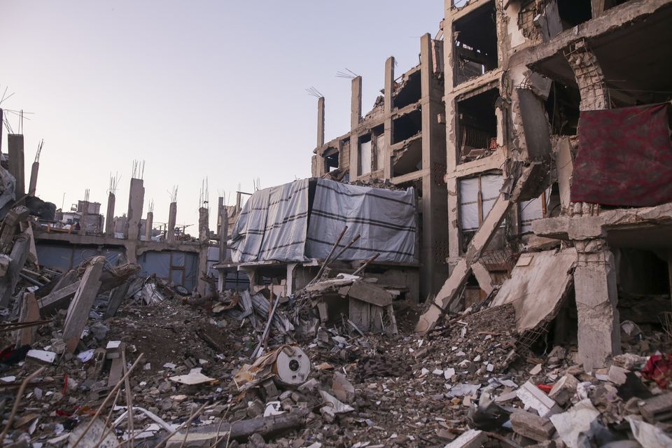 Palestinians have been returning to their homes in Gaza amid the rubble since the ceasefire took effect (Jehad Alshrafi/AP)