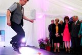 thumbnail: Prince Charles, Prince Of Wales and Camilla, Duchess of Cornwall watch an Irish dancing performance along with Tanaiste Joan Burton (in pink) and Minister for Arts, Heritage and Gaeltacht (L) at a welcome reception at National University of Ireland on May 19, 2015 in Galway  (Photo by Brian Lawless - WPA Pool/Getty Images)