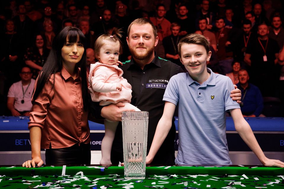 Happy family: Mark Allen, wife Kyla, daughter Harleigh and stepson Robbie with the Scottish Open trophy in Glasgow last night