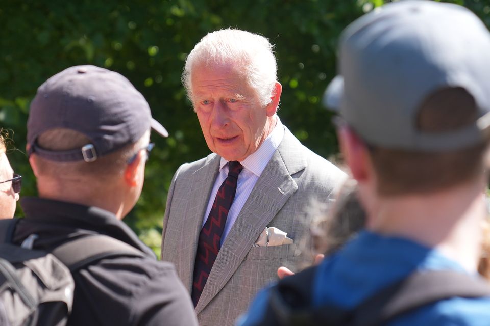 King Charles speaks with well wishers after attending a Sunday church service at St Mary Magdalene Church in Sandringham, Norfolk (Joe Giddens/PA)