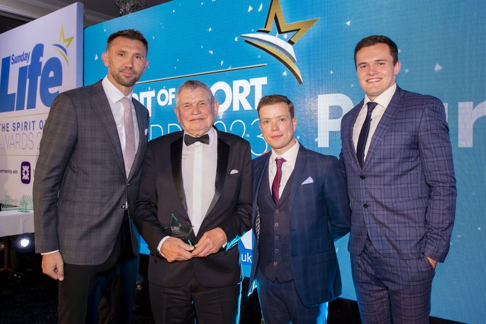 Pearse Tipping wins the Spirit of Sport Award, presented by Matthew Ferguson of Decathlon Belfast, alongside Gareth McAuley and Jacob Stockdale (Photo by Kevin Scott)