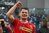 thumbnail: Cliftonville defender Paddy Burns celebrates the Reds' Irish Cup success after defeating Linfield