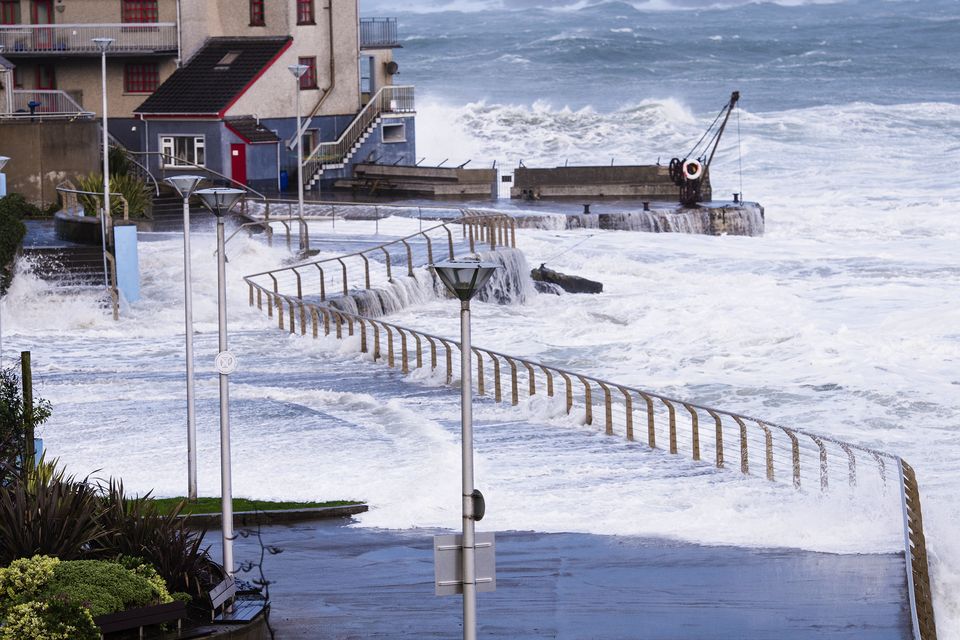 Waves cover the promenade at the Arcadia in Portrush