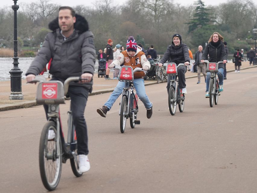 People cycling in Hyde Park on Christmas morning (Yui Mok/PA)