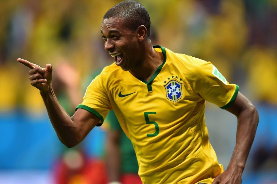 BRASILIA, BRAZIL - JUNE 23:  Fernandinho of Brazil celebrates scoring his team's fourth goal during the 2014 FIFA World Cup Brazil Group A match between Cameroon and Brazil at Estadio Nacional on June 23, 2014 in Brasilia, Brazil.  (Photo by Buda Mendes/Getty Images)