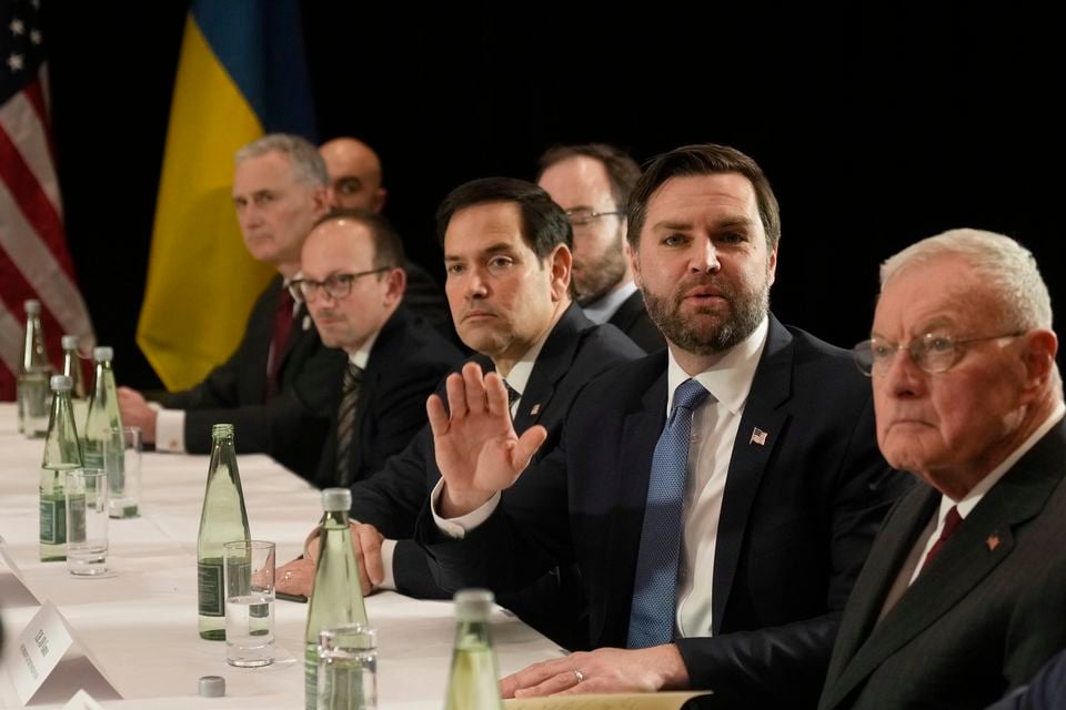 United States vice-president JD Vance, second right, and United States secretary of state Marco Rubio, centre, during a meeting with Ukraine’s President Volodymyr Zelensky on the sidelines of the Munich Security Conference (Matthias Schrader/AP)