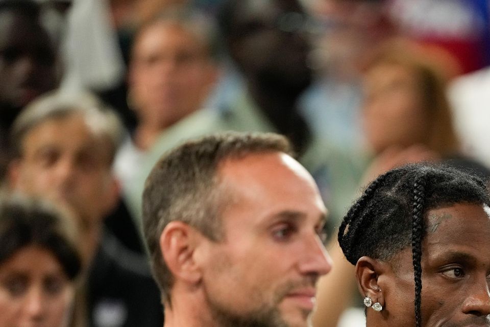 Travis Scott watches the Serbia vs United States game in Paris (Mark J Terrill/AP)