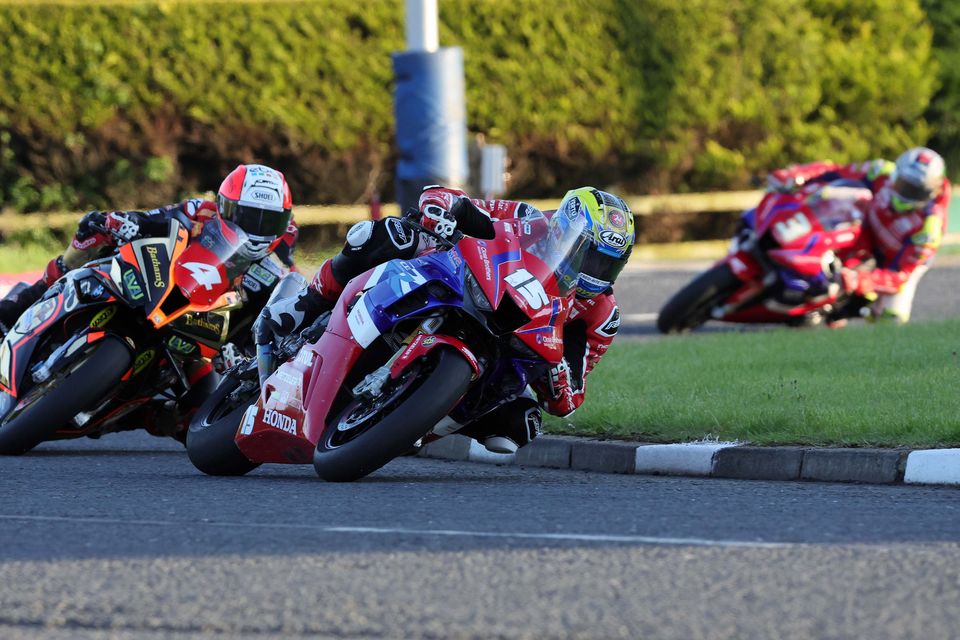 Superstock riders Nathan Harrison and Michael Rutter jostle for position during the 2023 North West 200
