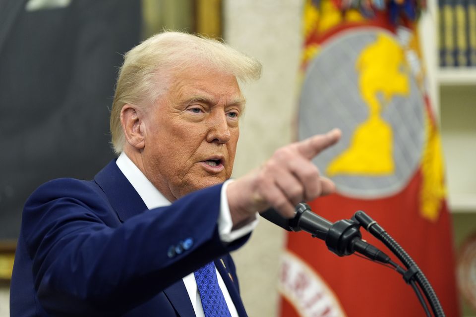 President Donald Trump speaks as Tulsi Gabbard is sworn in as the director of National Intelligence  (Alex Brandon)