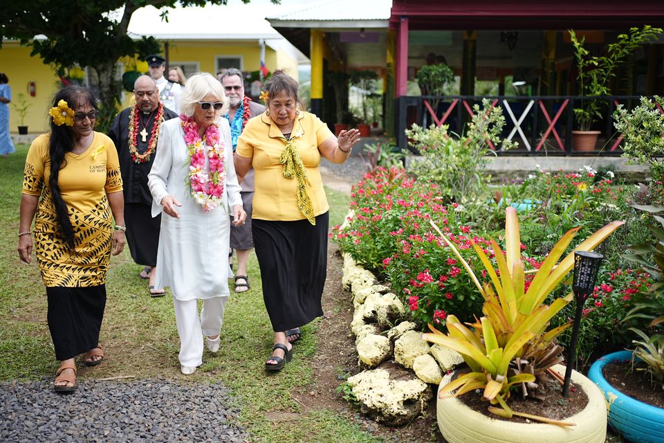 Camilla is given a tour during her visit to the Samoa Victim Support Group (Aaron Chown/PA)