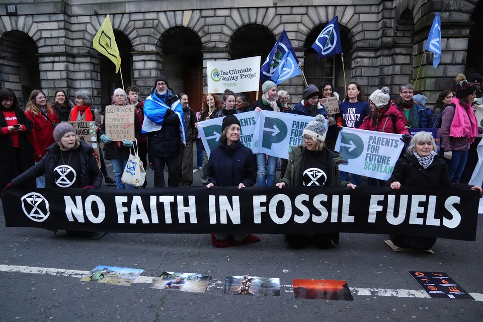 Protesters campaigned outside the Court of Session in Edinburgh during the hearings in November (Andrew Milligan/PA)