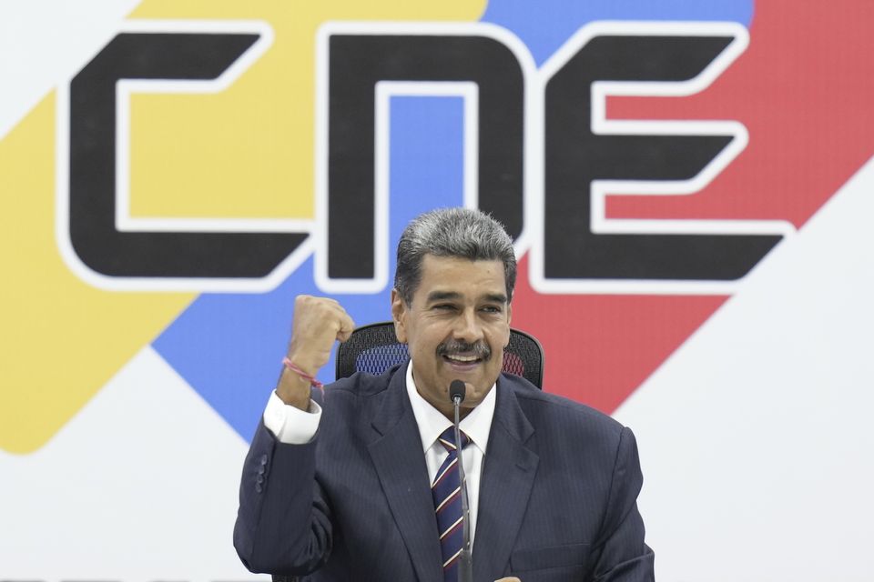 Venezuelan President Nicolas Maduro attends a ceremony at the National Electoral Council that certifies him as the winner of the presidential election (Matias Delacroix/AP)