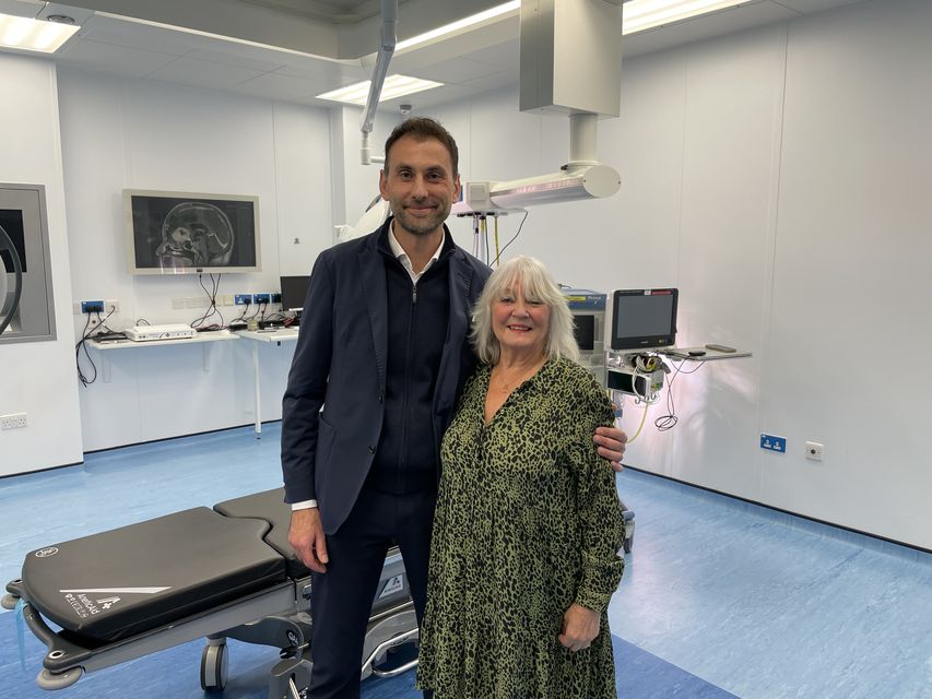 Surgeon Anastasios Giamouriadis with patient Doreen Adams (PA)