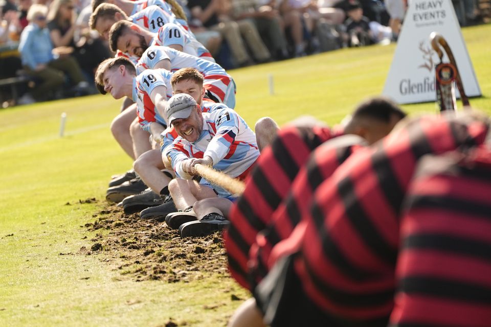 Competitors took part in traditional highland games including tug of war (Aaron Chown/PA)