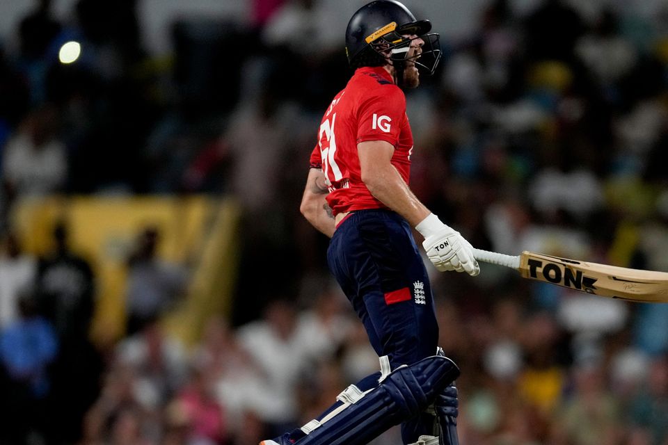 England’s Phil Salt celebrates scoring a century at Kensington Oval (Ricardo Mazalan/AP)