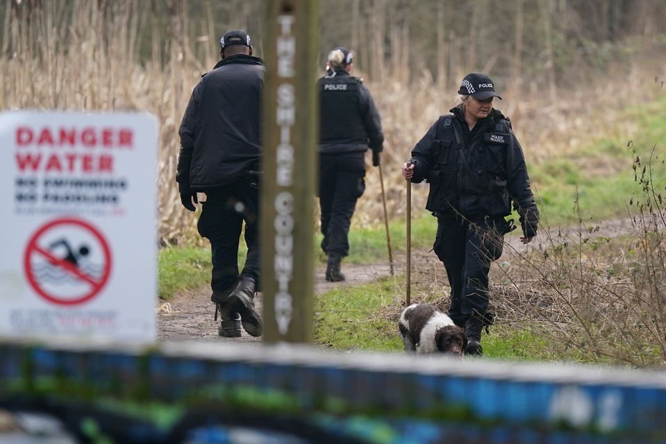 Police at the scene near Scribers Lane, Hall Green (Jacob King/PA)