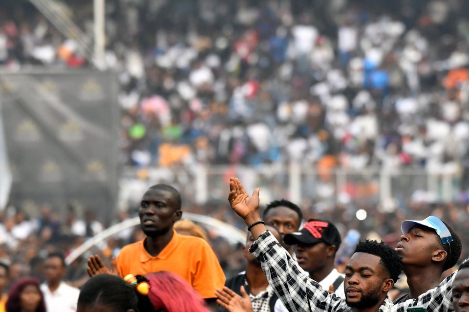 People attend a music concert at the Stade des Martyrs of Kinshasa (AP Photo/Samy Ntumba Shambuyi)