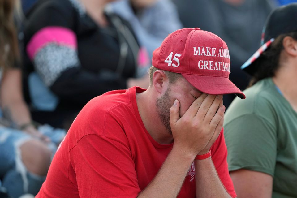 Family, friends and community attend a candlelight vigil for Corey Comperatore at the Lernerville Speedway in Sarver (Eric Gay/AP)