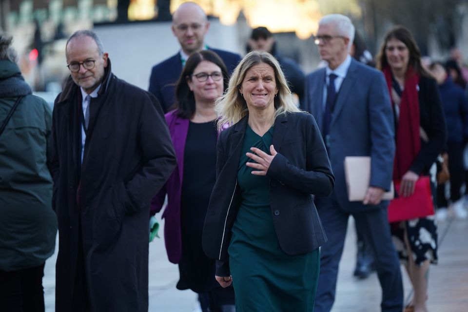 Labour MP Kim Leadbeater makes her way to speak to the media and supporters of the Dignity in Dying campaign group outside the Houses of Parliament (Yui Mok/PA)